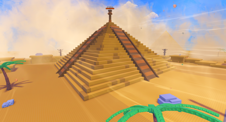 Wide desert build site with active brick carriers